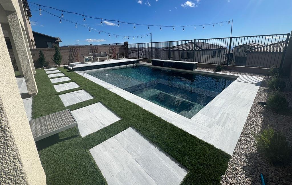 Long swimming pool with view of mountains